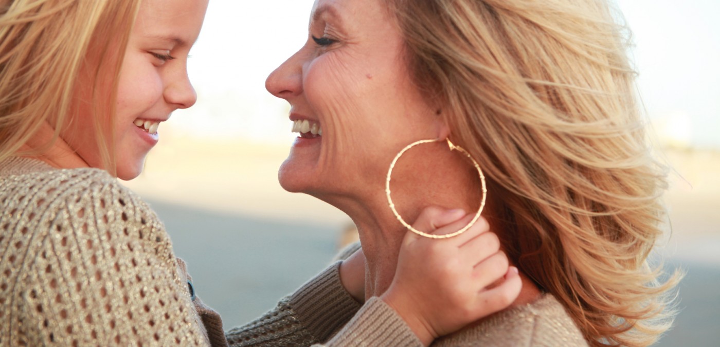 Happy retired woman with her granddaughter