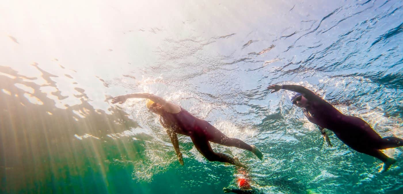 Triathlon Swimmers Competing for Lead In Race From Underwater