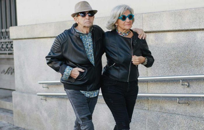 Fashionable senior couple walking together