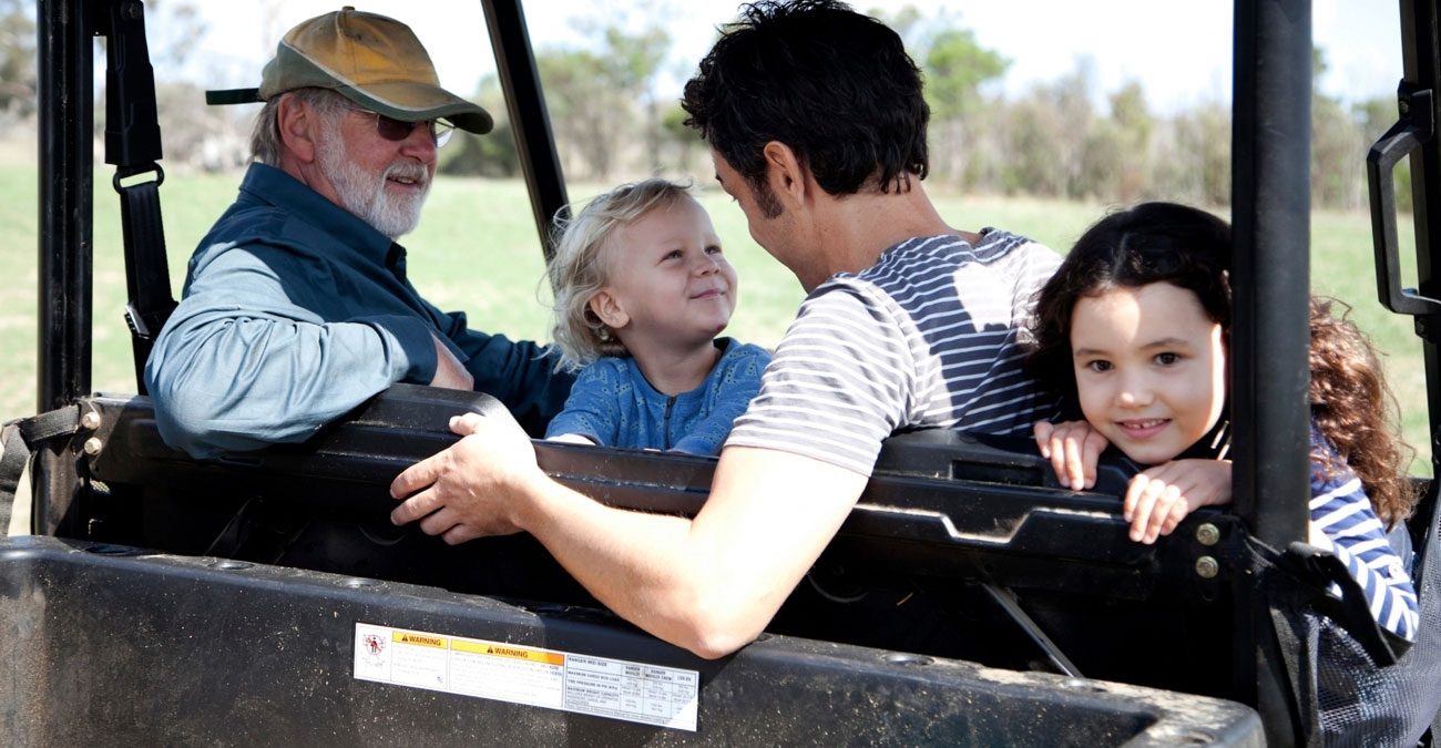 three generations on farm buggy