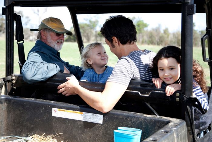 three generations on farm buggy