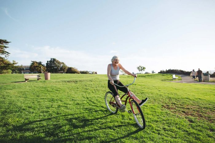 Elderly woman on bike