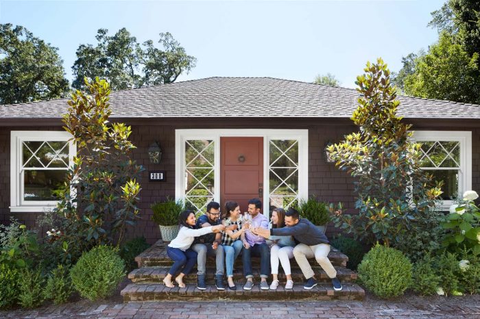 Group of friends celebrating a couple's first home purchase