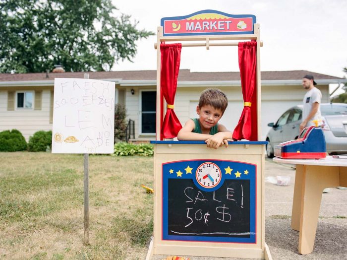 Young boy and his lemonade stand