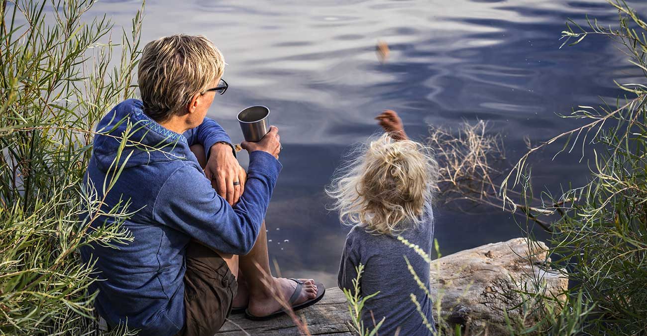 Lady and child near water