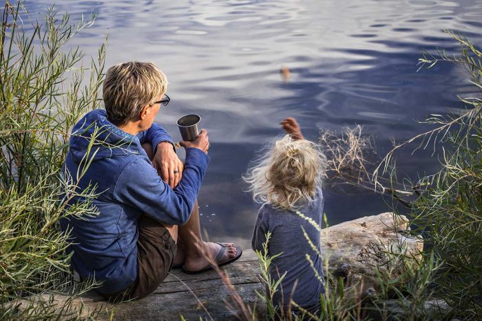 Lady and child near water