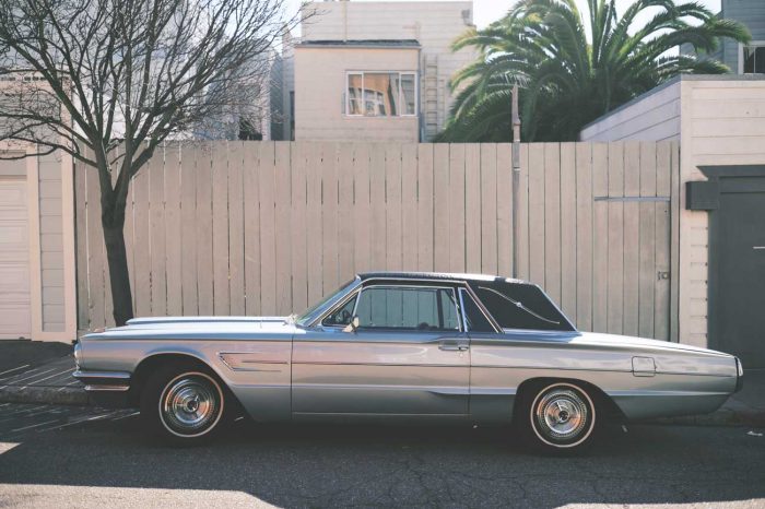 grey vintage car on the street